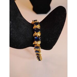 Gold Tone Blue Sapphire Oval Stone Tennis Bracelet with Extension Link 8 Inch